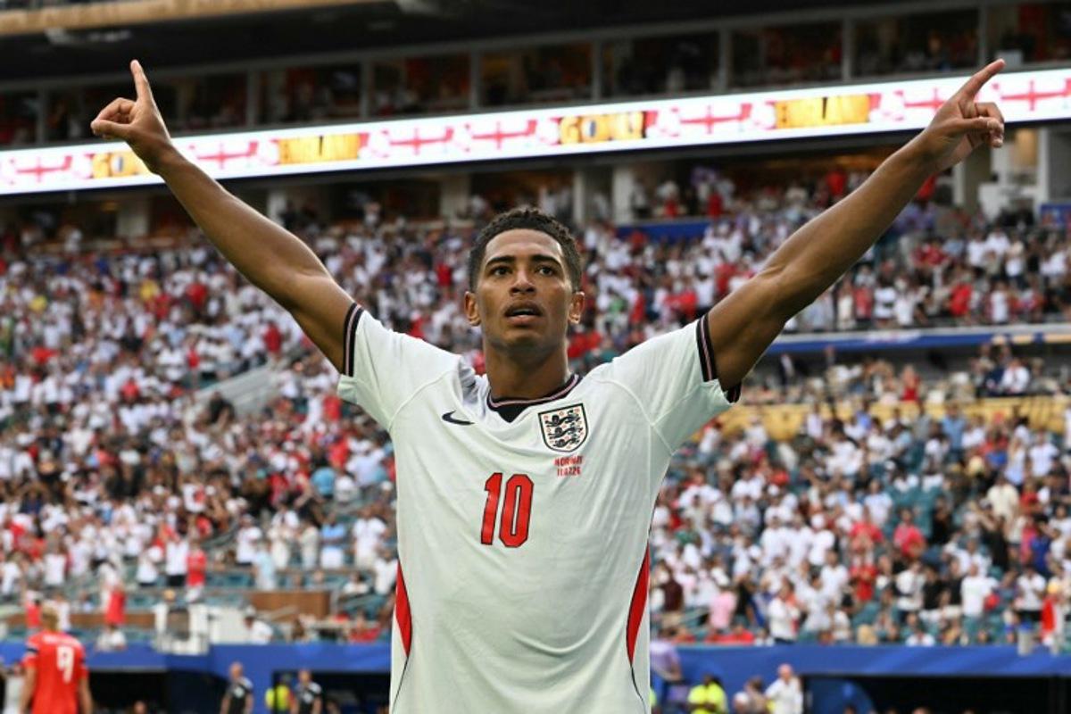 England's midfielder #10 Jude Bellingham celebrates after scoring his team's second goal during the 2026 World Cup football tournament quarter-final match between Norway and England at Miami Stadium in Miami on July 11, 2026.   ROBERTO SCHMIDT / AFP