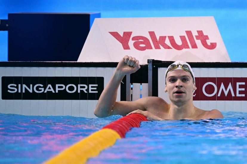 France's swimmer Leon Marchand celebrates winning the final of the men's 200m individual medley swimming event during the 2025 World Aquatics Championships in Singapore on July 31, 2025.  Oli SCARFF / AFP