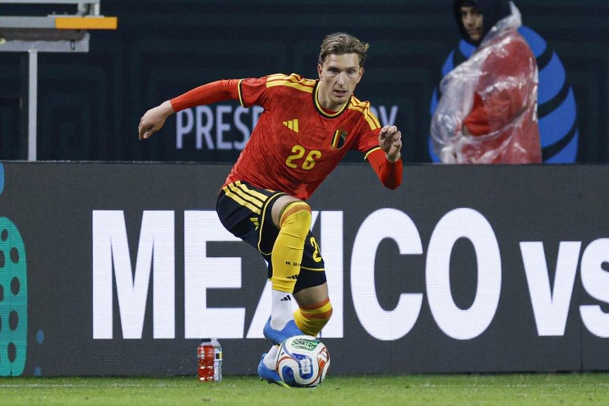 Belgium's forward #26 Mika Godts controls the ball during a friendly football match between Mexico and Belgium at Soldier Field in Chicago, Illinois, on March 31, 2026.  KAMIL KRZACZYNSKI / AFP
