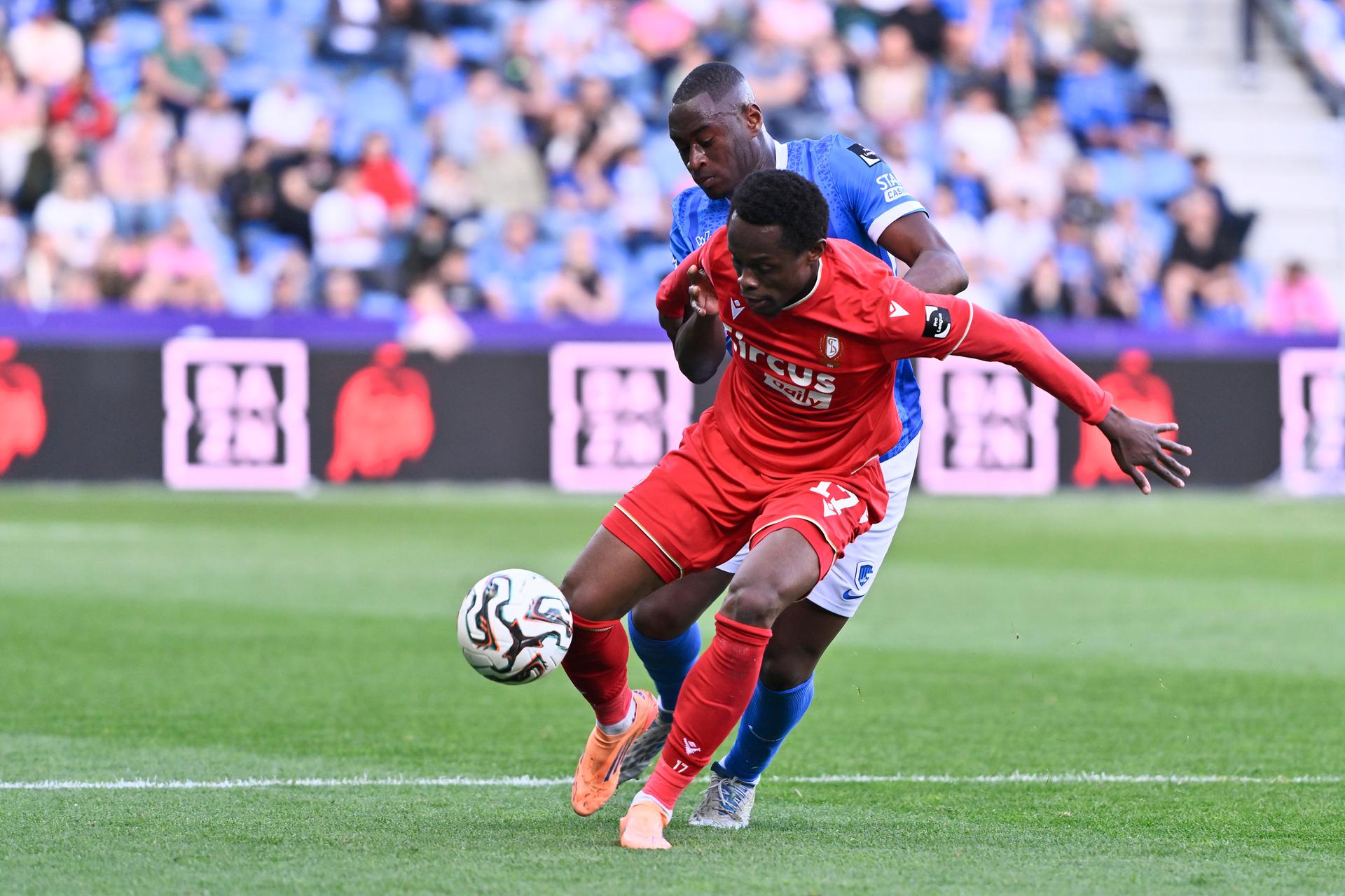 Genk's Mujaid Sadick and Standard's Rafiki Said fight for the ball during a soccer match between KRC Genk and Standard de Liege, Saturday 25 April 2026 in Genk, on day 5 of the Europe Play-offs (PO 2) of the 2025-2026 'Jupiler Pro League' first division of the Belgian championship. BELGA PHOTO JOHAN EYCKENS
