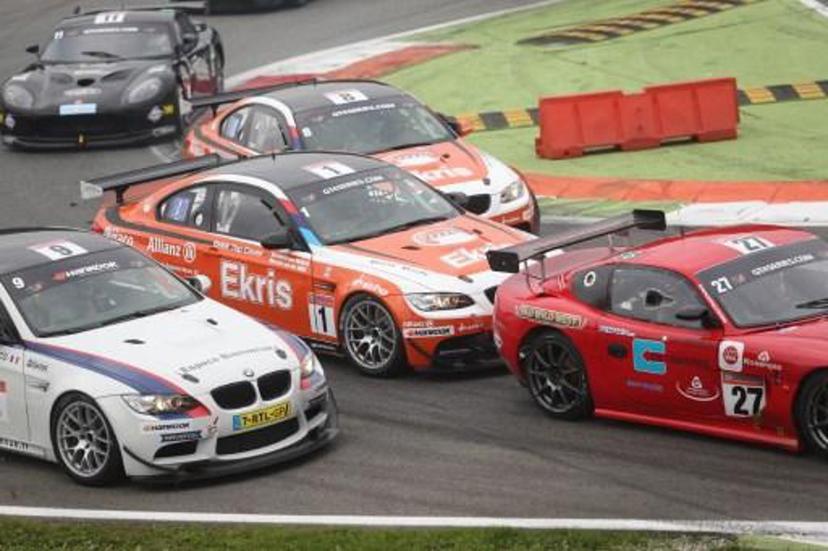 Prince Bernhard van Oranje of the Netherlands and team mate Ricardo van der Ende (car number 1-C) compete to win the GT4 European series race at the Autodromo Nazionale in Monza on October 26, 2014.   AFP PHOTO / FABRIZIO RADAELLI ***ITALY OUT*** ***ITALY OUT***

