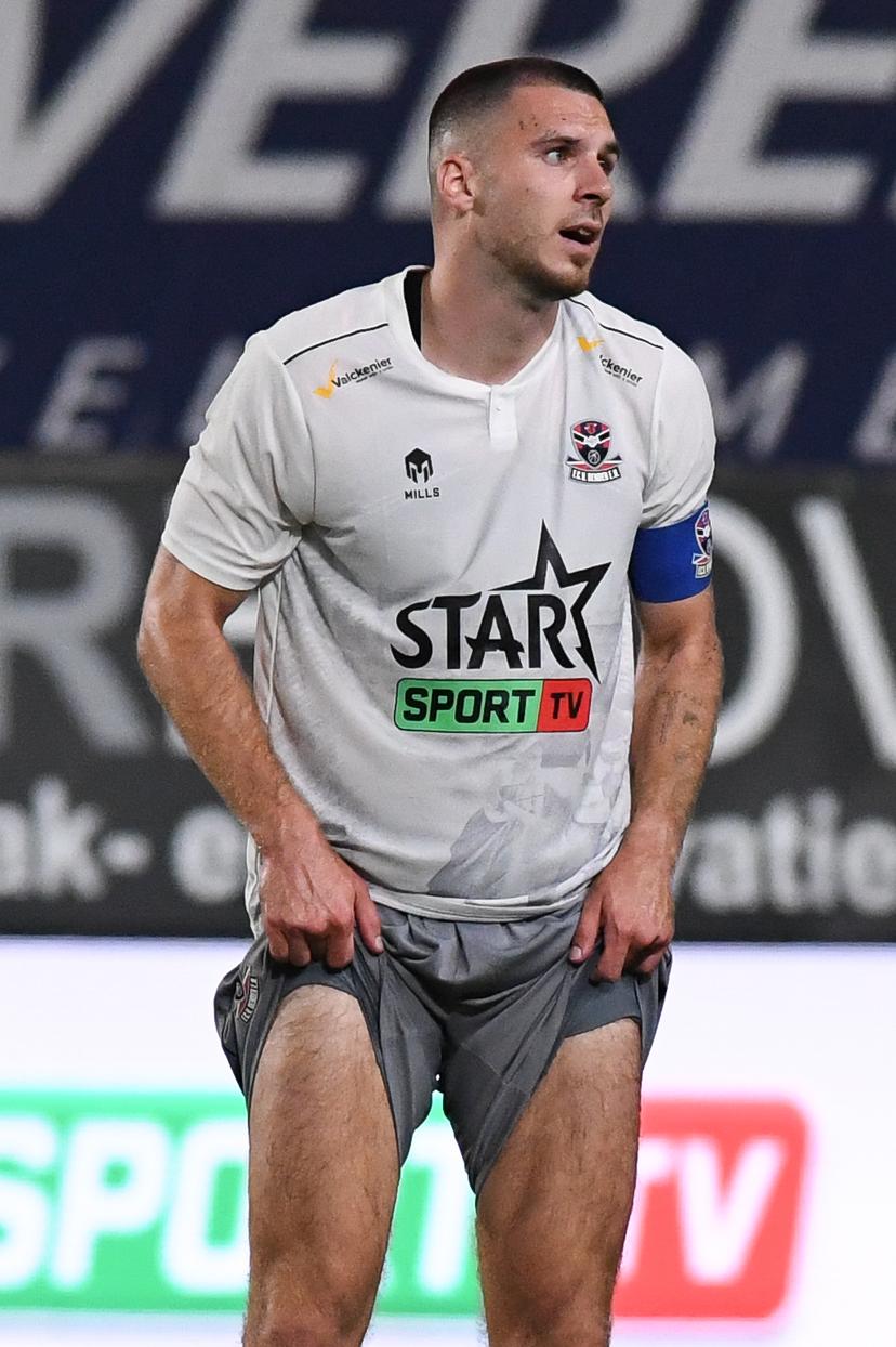 Dender's Joedrick Pupe looks dejected after losing a soccer match between Sint-Truiden VV and FCV Dender EH, Friday 08 August 2025 in Sint-Truiden, on the day 3 of the 2025-2026 'Jupiler Pro League' first division of the Belgian championship. BELGA PHOTO JILL DELSAUX