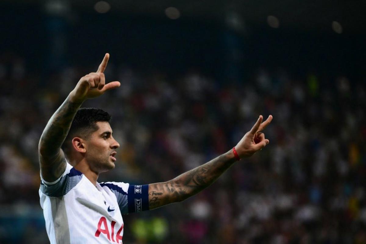 Tottenham Hotspur's Argentinian defender #17 Cristian Romero celebrates after scoring Tottenham's second goal during the 2025 UEFA Super Cup final football match between Paris Saint-Germain (FRA) and Tottenham Hotspur FC (ENG) at the Friuli stadium, in Udine, on August 13, 2025.  Marco BERTORELLO / AFP
