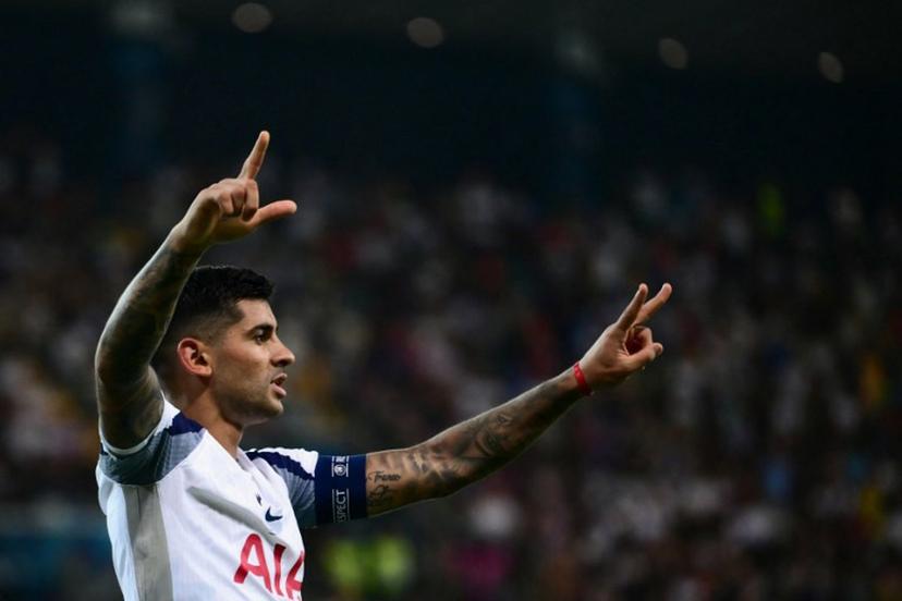 Tottenham Hotspur's Argentinian defender #17 Cristian Romero celebrates after scoring Tottenham's second goal during the 2025 UEFA Super Cup final football match between Paris Saint-Germain (FRA) and Tottenham Hotspur FC (ENG) at the Friuli stadium, in Udine, on August 13, 2025.  Marco BERTORELLO / AFP