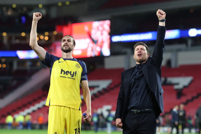 Union's Christian Burgess and Union's head coach Sebastien Pocognoli celebrate after winning a soccer game between Dutch team PSV Eindhoven and Belgian team Royale Union Saint-Gilloise, in Eindhoven, The Netherlands, on Tuesday 16 September 2025, on the opening day of the League phase of the UEFA Champions League tournament. BELGA PHOTO VIRGINIE LEFOUR