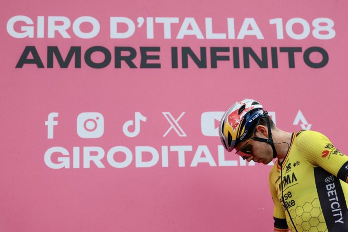 Team Visma-Lease a Bike's Belgian rider Wout Van Aert waits before the start of the 14th stage of the 108th Giro d'Italia cycling race of 195kms from Treviso in Italy to Nova Gorica in Slovenia on May 24, 2025.  Luca Bettini / AFP