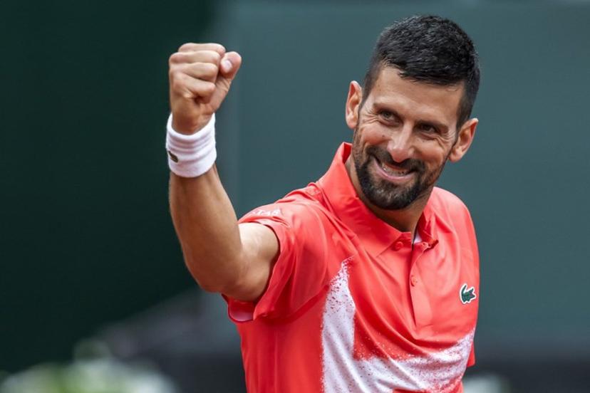 Serbia's Novak Djokovic celebrates his victory at the end of his match against Hungary's Marton Fucsovics at the ATP 250 Geneva Open tennis tournament in Geneva on May 21, 2025.   FABRICE COFFRINI / AFP