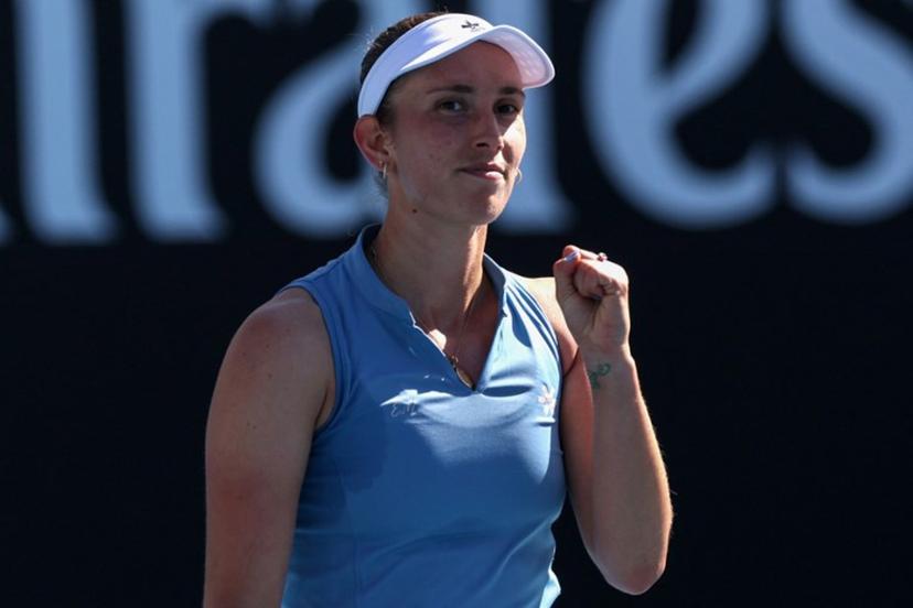 Belgium's Elise Mertens celebrates beating Japan's Moyuka Uchijima in their women's singles match on day five of the Australian Open tennis tournament in Melbourne on January 22, 2026.  IZHAR KHAN / AFP