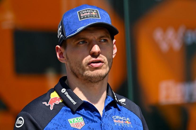 Red Bull Racing's Dutch driver Max Verstappen walks down the paddock ahead of the Formula One British Grand Prix at the Silverstone motor racing circuit in Silverstone, central England, on July 2, 2026.  Andrej ISAKOVIC / AFP