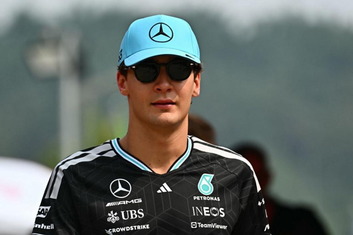 Mercedes' British driver George Russell arrives ahead of the Formula One Bahrain Grand Prix in Sepang on October 4, 2026.  Lillian SUWANRUMPHA / AFP