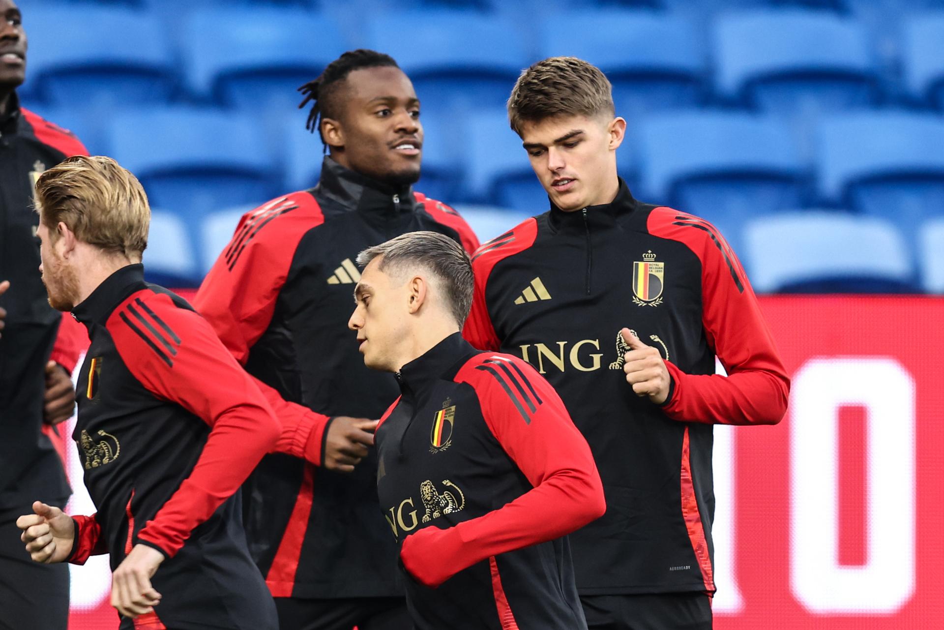 Belgium's Michy Batshuayi, Belgium's Leandro Trossard and Belgium's Charles De Ketelaere pictured during a training session of Belgian national soccer team Red Devils in Cardiff, Wales on Sunday 12 October 2025. The team is preparing for tomorrow's match against Wales, qualifier 6/8 for the 2026 World Cup. BELGA PHOTO BRUNO FAHY