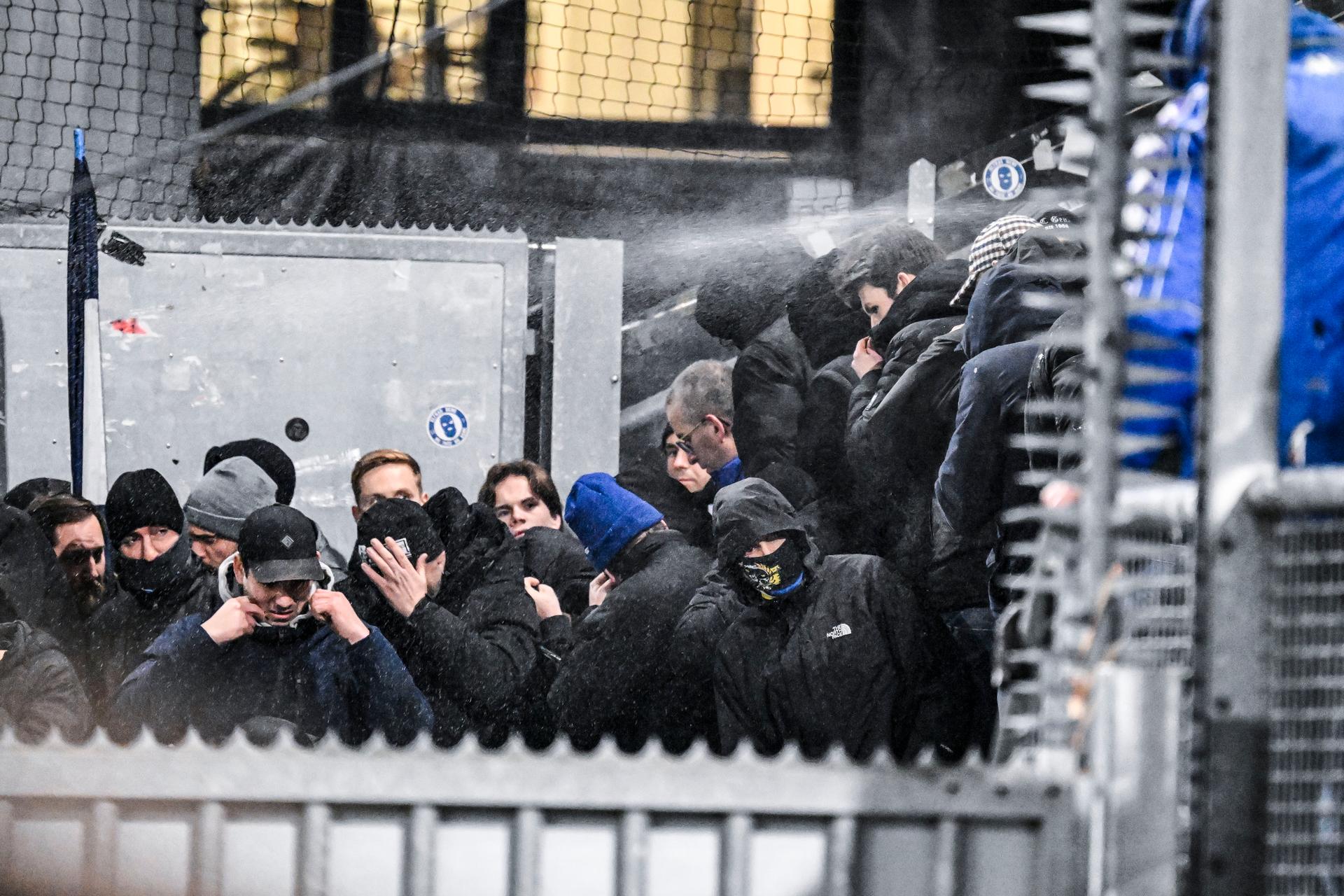 KRC Genk supporters receive pepperspray in their faces ahead of a soccer game between Dutch soccer club FC Utrecht and Belgian KRC Genk, on Thursday 22 January 2026 in Utrecht, Netherlands, the seventh game (out of 8) in the league phase of the UEFA Europa League competition. BELGA PHOTO TOM GOYVAERTS