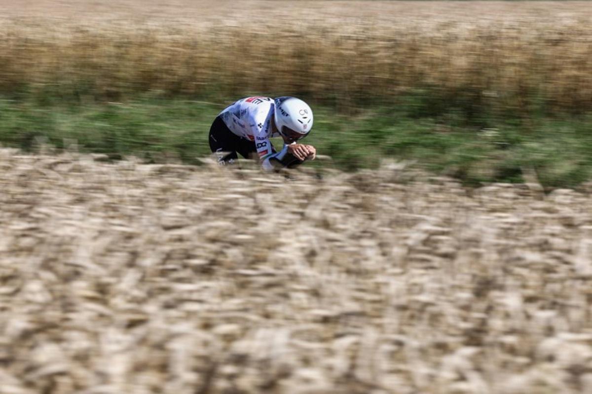 UAE Team Emirate - XRG team's Portuguese rider Joao Almeida cycles during the 5th stage of the 112th edition of the Tour de France cycling race, 33 km individual time trial starting and finishing in Caen, northwestern France, on July 9, 2025.  Anne-Christine POUJOULAT / AFP