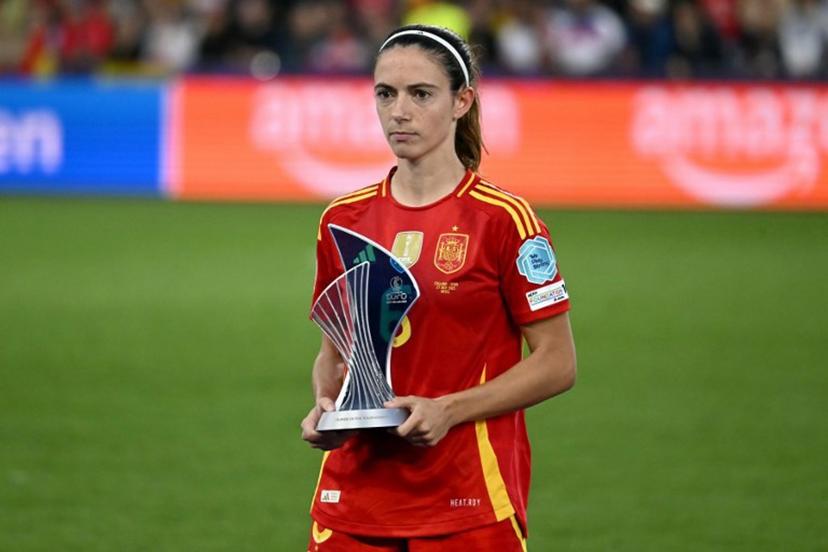 Spain's midfielder #06 Aitana Bonmati holds the trophy after winning Best Player of the Tournament Award after Spain lost to England in the UEFA Women's Euro 2025 final football match between England and Spain at the St. Jakob-Park Stadium in Basel, on July 27, 2025.  Fabrice COFFRINI / AFP