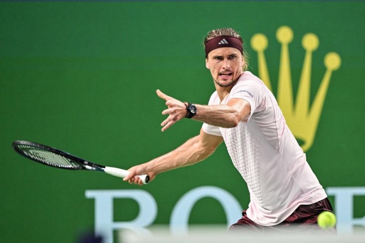 Germany's Alexander Zverev hits a return to France's Quentin Halys during their men's singles match at the Shanghai Masters tennis tournament in Shanghai on October 11, 2026.  Hector RETAMAL / AFP