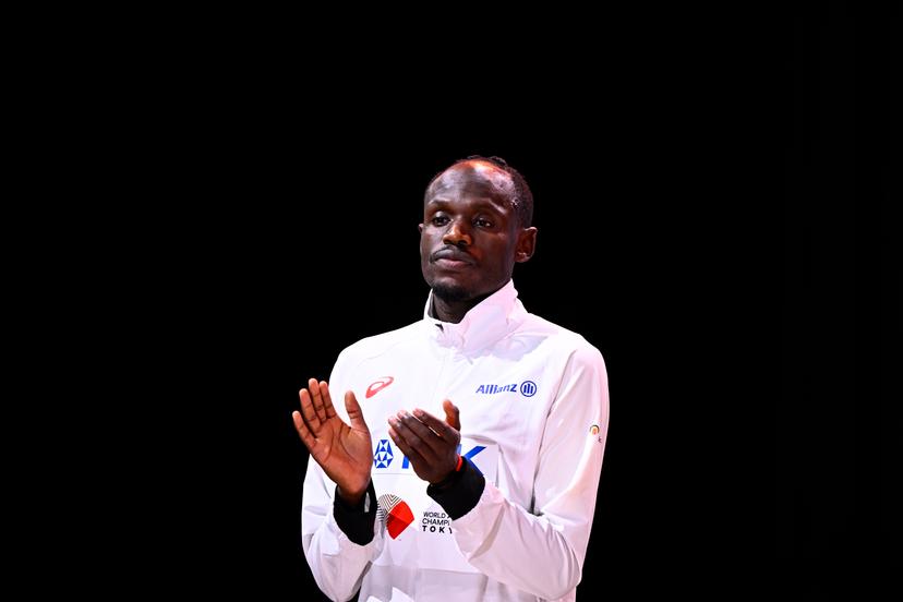 Belgian Isaac Kimeli celebrates on the podium after the 5000m men final, at the World Athletics Championships in Tokyo, Japan, on Sunday 21 September 2025. The outdoor Worlds are taking place from 13 to 21 September. BELGA PHOTO JASPER JACOBS