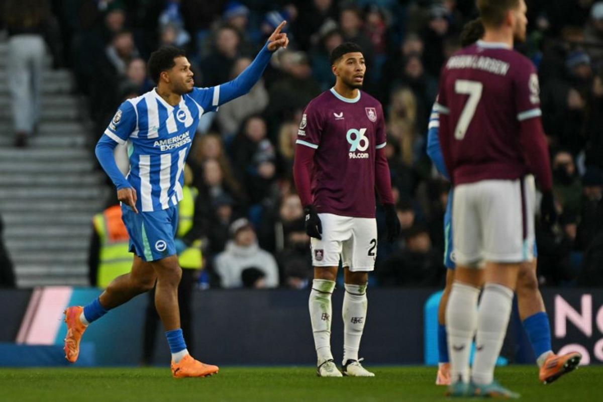 Brighton's French midfielder #10 Georginio Rutter celebrates scoring the opening goal to take the lead 1-0 during the English Premier League football match between Brighton and Hove Albion and Burnley at the American Express Community Stadium in Brighton, southern England on January 3, 2026.  Glyn KIRK / AFP