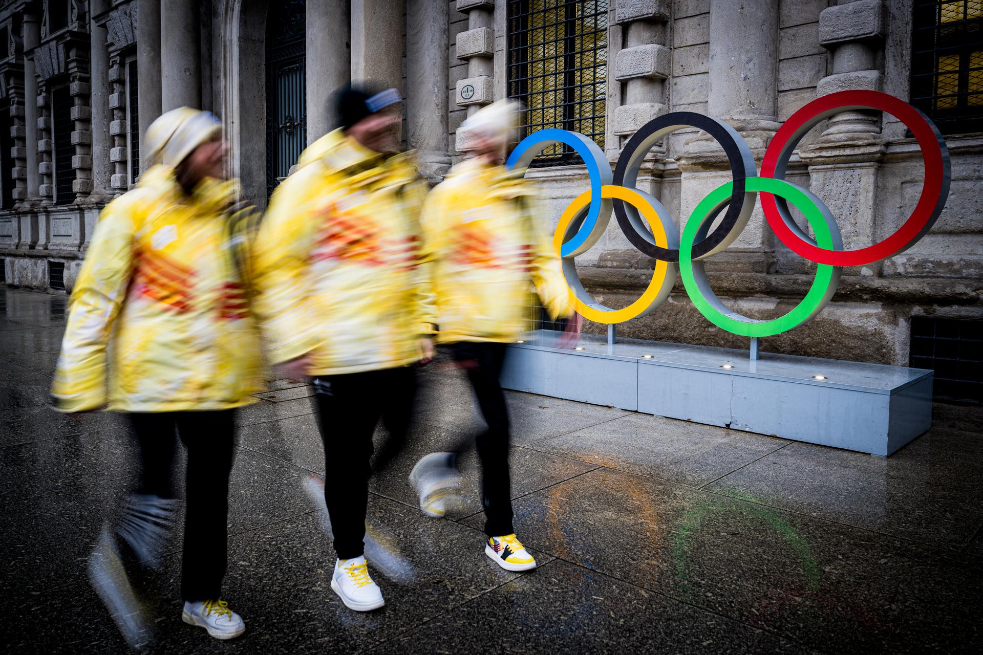 Picture shows Team Belgium staff with Olympic rings pictured during a visit to the citty center prior to the Milano Cortina 2026 Olympic Winter Games, on Wednesday 04 February 2026 in Milan, Italy. The XXV Winter Olympics take place from 6 to 22 February 2026 in Italy. BELGA PHOTO JASPER JACOBS