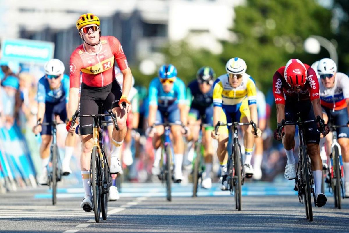 Norway's Soren Waerenskjold (L) rides to win the second stage of the PostNord cycling Tour of Denmark (Danmark Rundt) in Gladsaxe, Denmark, on August 13, 2025.  Mads Claus Rasmussen / Ritzau Scanpix / AFP