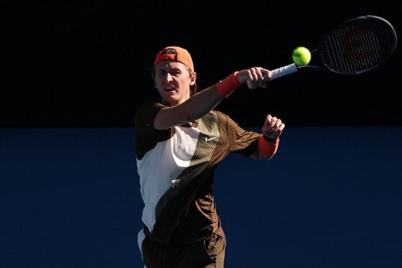 USA's Sebastian Korda hits a return to compatriot Michael Zheng during their men's singles match on day one of the Australian Open in Melbourne on January 18, 2026.  IZHAR KHAN / AFP