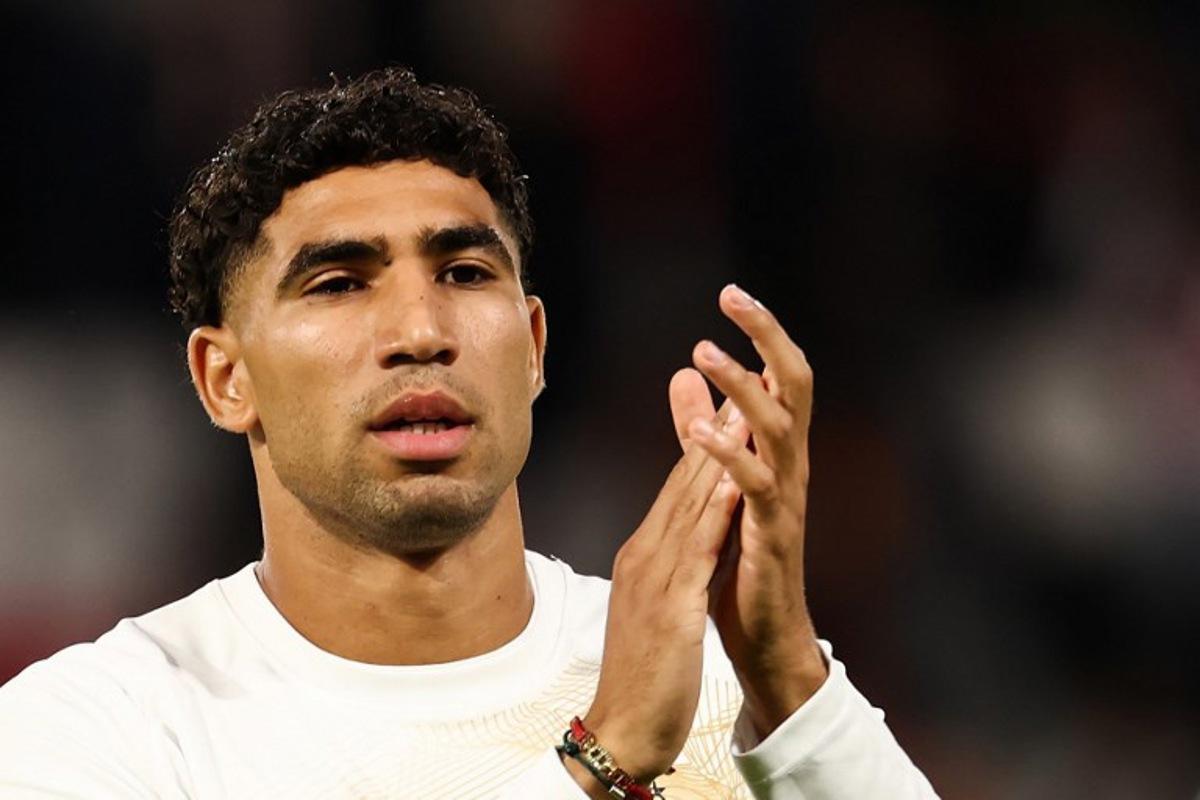 Paris Saint-Germain's Moroccan defender #02 Achraf Hakimi applauds as he warms up during the UEFA Champions League, league phase, matchday 1, football match between Paris Saint-Germain (PSG) and Slovan Bratislava at the Parc des Princes Stadium in Paris on September 9, 2026.  FRANCK FIFE / AFP