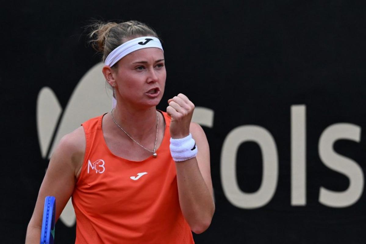 Czech Republic's Marie Bouzkova celebrates a point against Hungary's Panna Udvardy during the WTA Bogota women's singles final match at the Country Club in Bogota on April 5, 2026.  RAUL ARBOLEDA / AFP