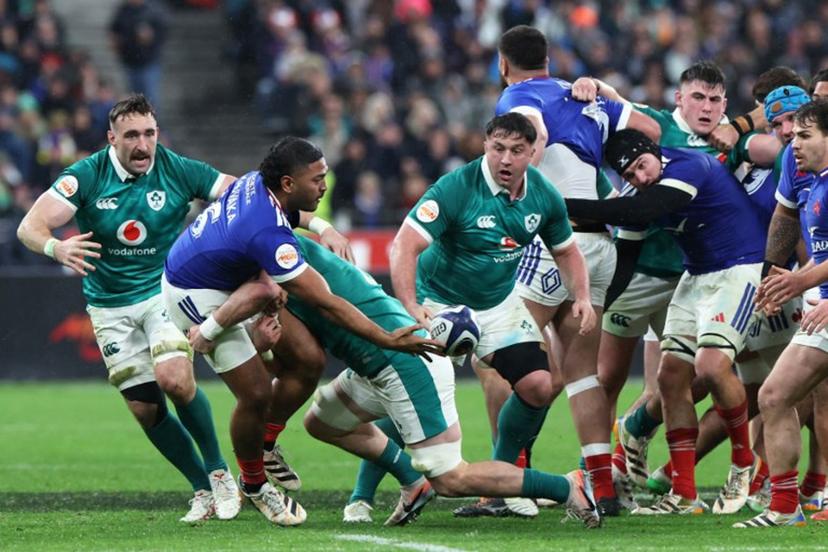 France's hooker Peato Mauvaka attempts an off-load pass during the Six Nations international rugby union match between France and Ireland at the Stade de France in Saint-Denis, Paris' suburb, on February 5, 2026.  ALAIN JOCARD / AFP