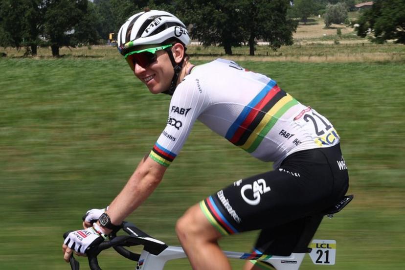 UAE Team Emirates XRG's Slovenian rider Tadej Pogačar reacts as he cycles during the 5th stage of the 77th edition of the Criterium du Dauphine cycling race, 183 km between Saint-Priest and Mâcon, on June 12, 2025.  Anne-Christine POUJOULAT / AFP