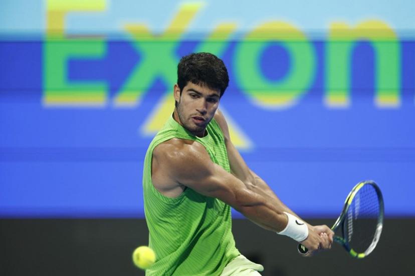 Spain's Carlos Alcaraz hits a return against Russia's Karen Khachanov during their men's singles quarterfinal match at the Qatar Open tennis tournament in Doha on February 19, 2026.  Karim JAAFAR / AFP