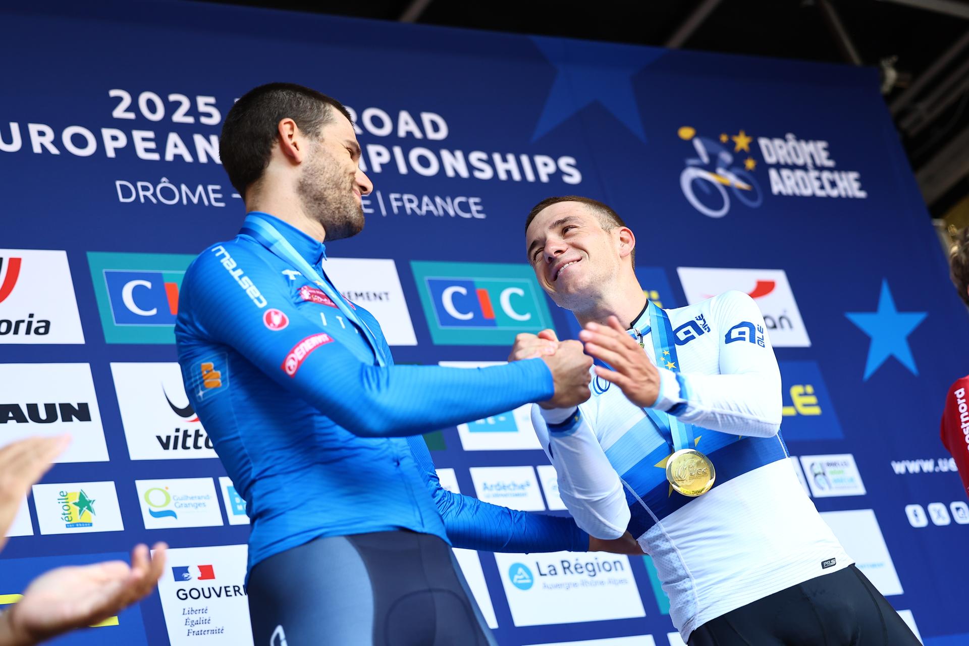 L-R, Italian Filippo Ganna and Belgian Remco Evenepoel celebrate on the podium of the 24 km time trial of the Men Elite category at the UEC road European cycling championships, Wednesday 01 October 2025, in Loriol-sur-Drome, France. The European cycling championships Drome-Ardeche takes place from 1 to 5 October, France. BELGA PHOTO DAVID PINTENS
