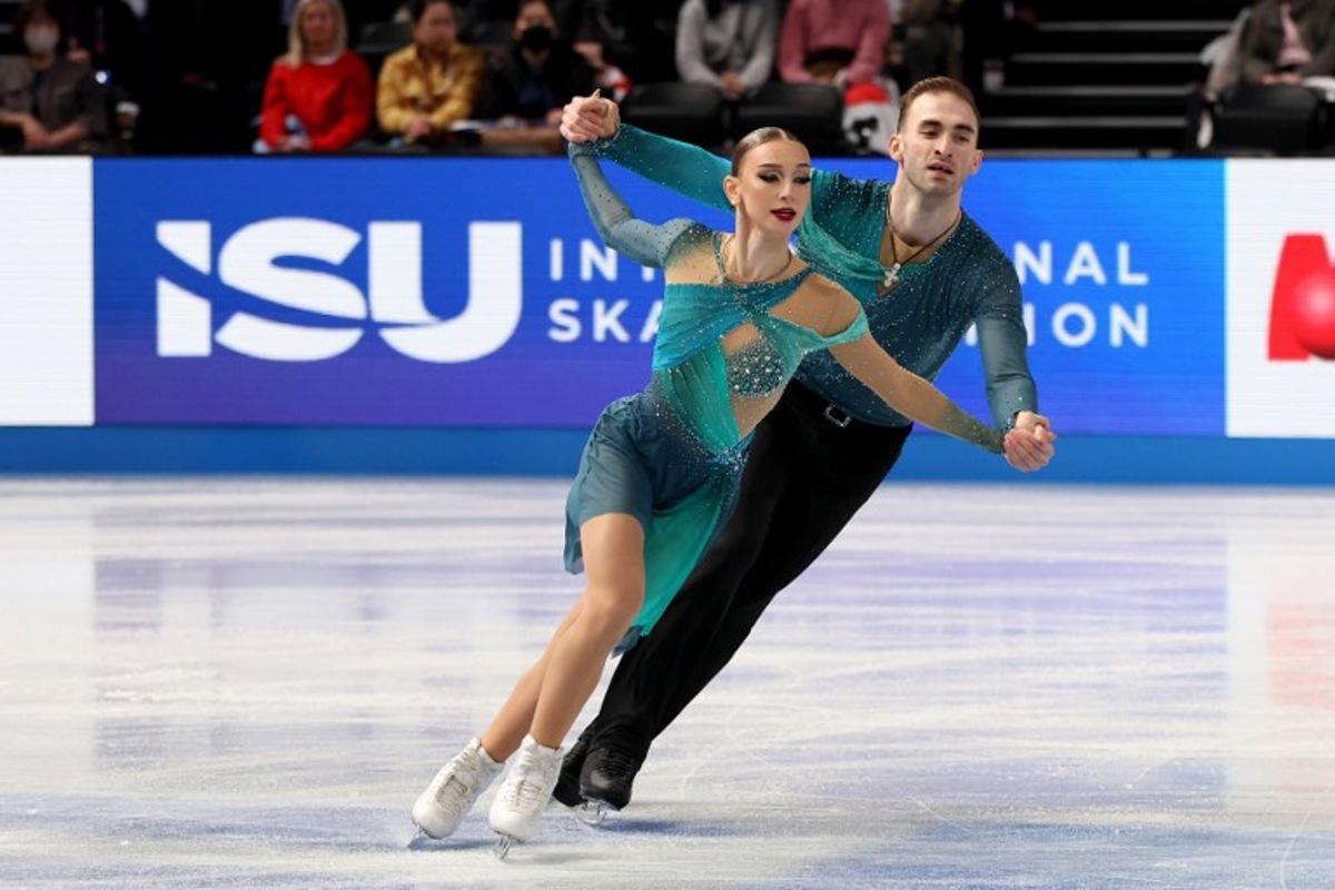 Georgia's Anastasiia Metelkina and Luka Berulava compete in the Senior Pairs Free Skating at the ISU Grand Prix of Figure Skating Final in Nagoya on December 5, 2025.  PAUL MILLER / AFP
