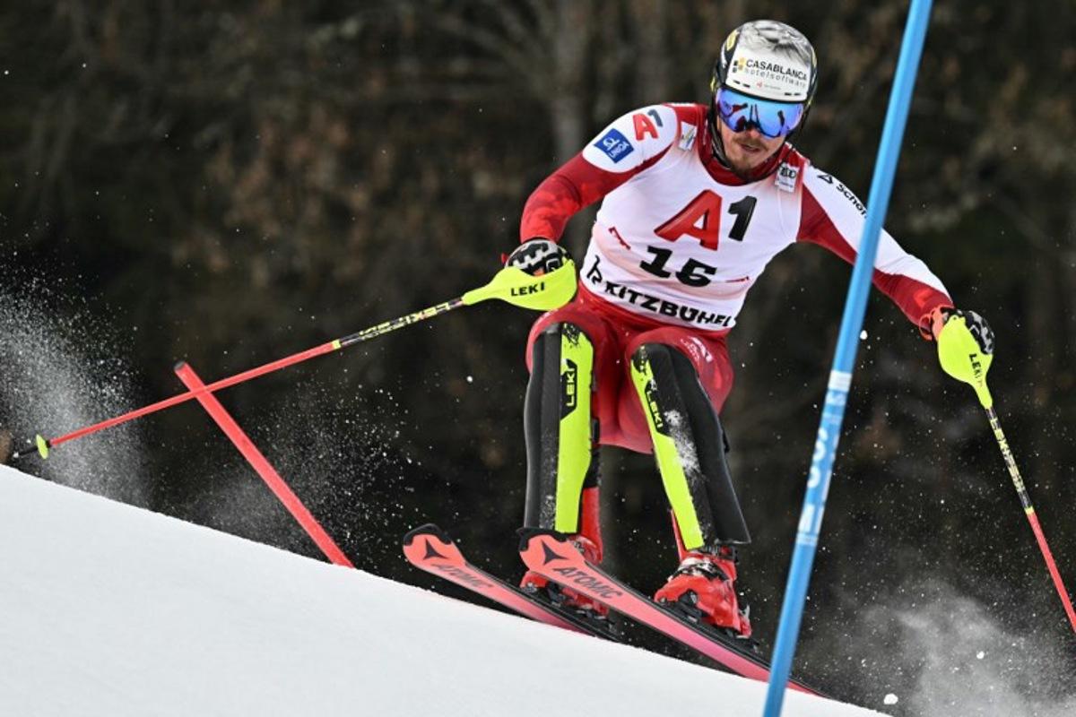 Austria's Manuel Feller races during the Men's slalom event of the FIS Alpine Skiing World Cup in Kitzbuehel, Austria, on January 25, 2026.  Joe Klamar / AFP