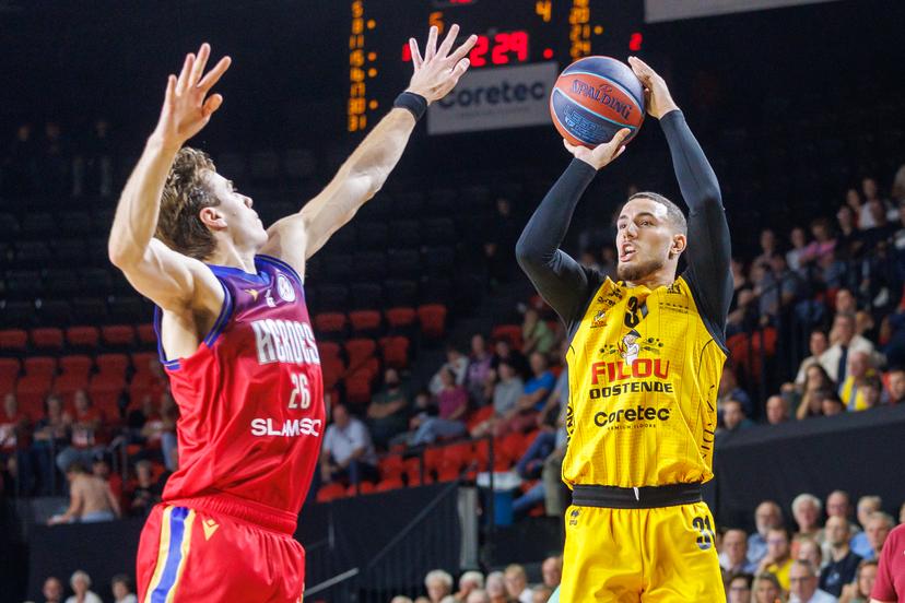 Den Bosch' Keevan Veinot and Oostende's Noam Yaacov fight for the ball during a basketball match between Belgian BC Oostende and Dutch Heroes Den Bosch, Saturday 20 September 2025 in Oostende, the supercup of the 'BNXT League' Belgian/Dutch first division basket championship between the champion of Belgium and the Netherlands. BELGA PHOTO KURT DESPLENTER