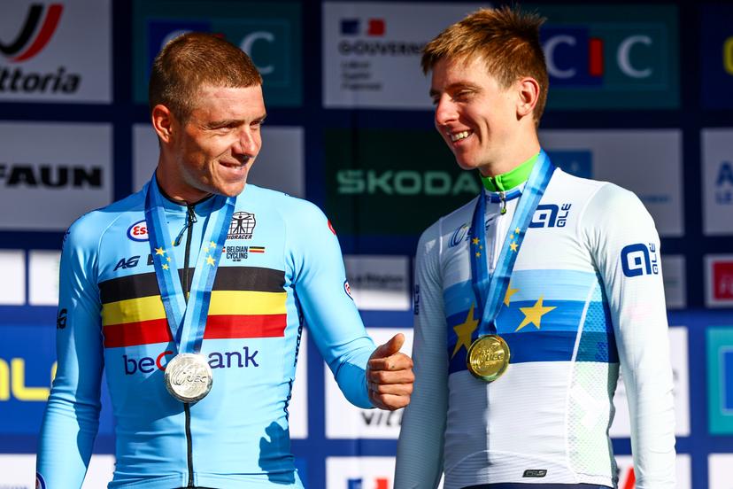 Belgium Remco Evenepoel and Slovenia Tadej Pogacar celebrate on the podium of the Men Elite raod race, a 202,5 km from Privas to Guilherand-Granges, at the UEC road European cycling championships, Sunday 05 October 2025, France. The European cycling championships Drome-Ardeche takes place from 1 to 5 October, France. BELGA PHOTO DAVID PINTENS