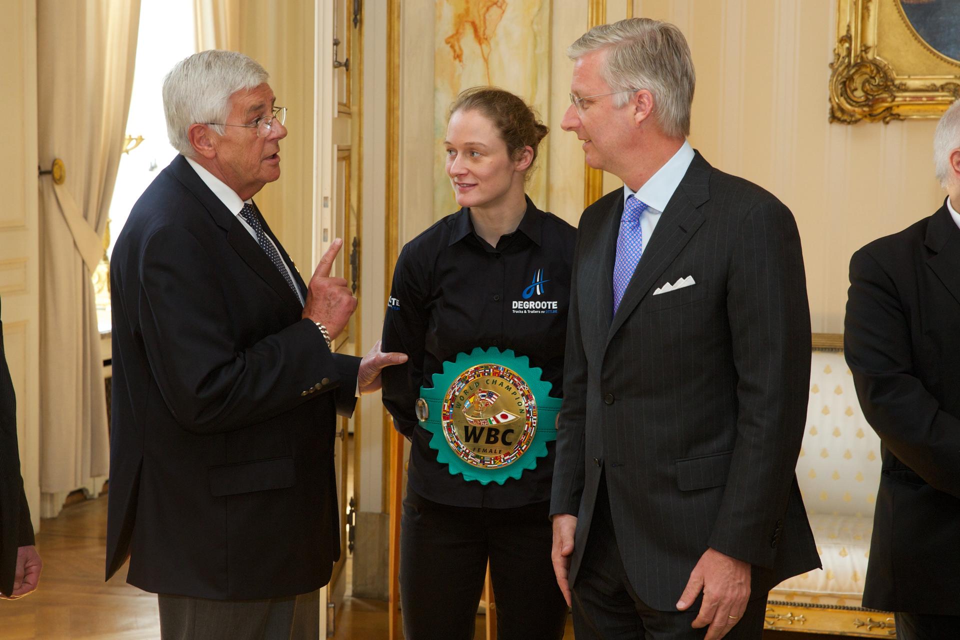 20140428 - BRUSSELS, BELGIUM: Chairman of WBC Bob Logist, Belgian Delfine Persoon and King Philippe - Filip of Belgium pictured during as King receives the winner of the world title of the WBC female lightweight, Monday 28 April 2014 at Royal Palace in Brussels. BELGA PHOTO KURT DESPLENTER