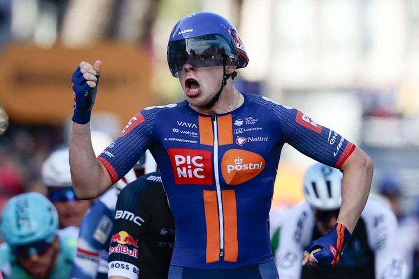 Team Picnic PostNL's Dutch rider Casper Van Uden celebrates as he crosses the finish line of the 4th stage of the 108th Giro d'Italia cycling race 189kms from Alberobello to Lecce on May 13, 2025  Luca Bettini / AFP