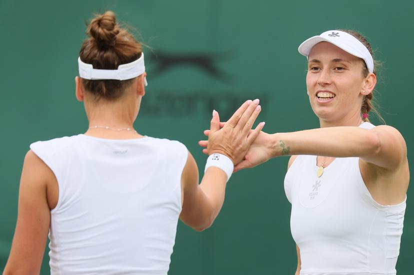 Russian Veronika Kudermetova and Belgian Elise Mertens pictured during a doubles tennis match against Czech-Kazakh pair Bouzkova-Danilina, in the second round of the women's doubles at the 2025 Wimbledon grand slam tournament, Saturday 05 July 2025 at the All England Tennis Club, in South-West London, Britain. BELGA PHOTO BENOIT DOPPAGNE