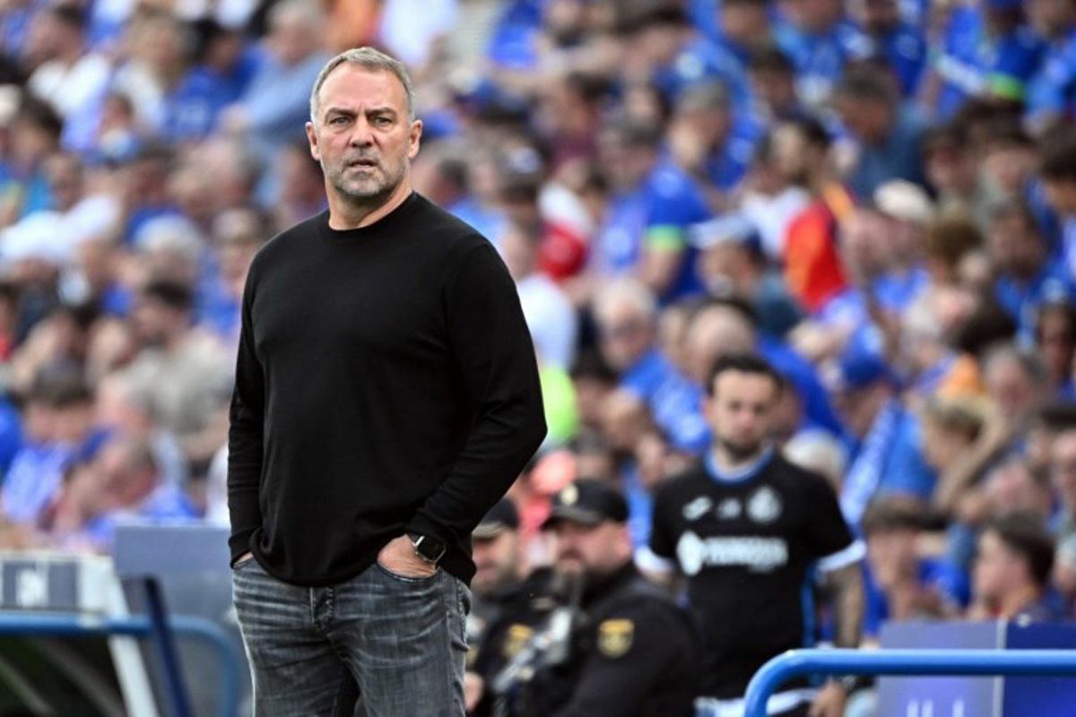 Barcelona's German coach Hans-Dieter Flick is pictured during the Spanish league football match between Getafe CF and FC Barcelona at the Coliseum stadium in Getafe on April 25 , 2026.  Javier SORIANO / AFP