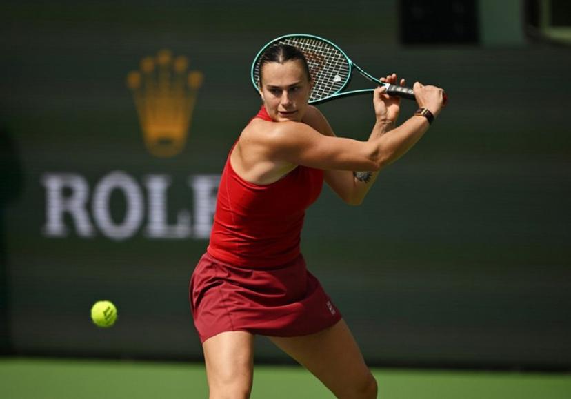 Belarus' Aryna Sabalenka returns the ball to Russia's Mirra Andreeva during the women's singles final tennis match at the BNP Paribas Open at the Indian Wells Tennis Garden in Indian Wells, California, on March 16, 2025.  Patrick T. Fallon / AFP