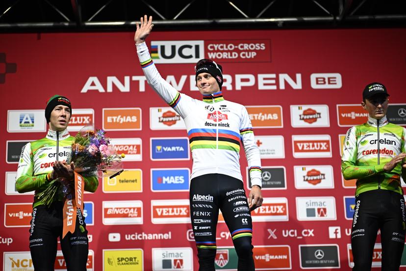 Belgian Laurens Sweeck, Dutch Mathieu Van Der Poel and Belgian Emiel Verstrynge pictured on the podium after the men's elite race of the World Cup cyclocross cycling event in Antwerp on Saturday 20 December 2025, the fifth stage (out of 12) of the UCI World Cup competition. BELGA PHOTO JASPER JACOBS