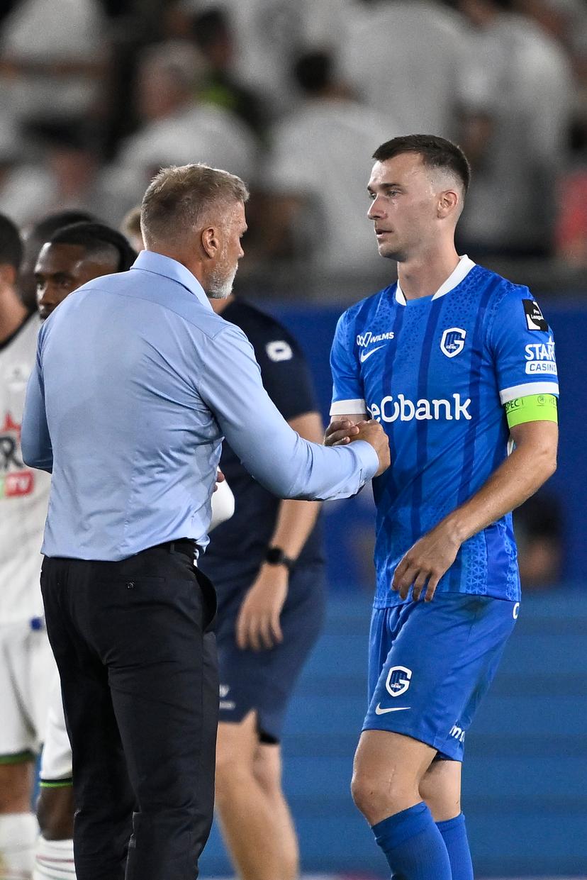 Genk's head coach Thorsten Fink and Genk's Bryan Heynen pictured after winning a soccer match between Oud-Heverlee Leuven and KRC Genk, Friday 15 August 2025 in Leuven, on day 4 of the 2025-2026 'Jupiler Pro League' first division of the Belgian championship. BELGA PHOTO JOHAN EYCKENS