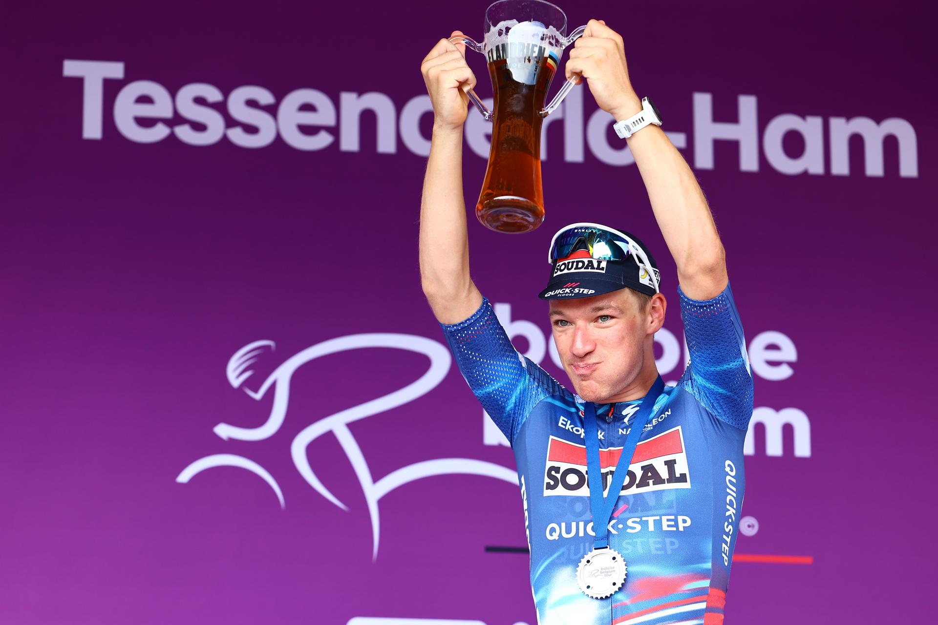 British Ethan Hayter of Soudal Quick-Step celebrates on the podium after winning the third stage of the Baloise Belgium Tour cycling race, a 9,7km individual time trial from Tessenderlo to Ham, Friday 20 June 2025. The Baloise Belgium Tour takes place from 18 to 22 June. BELGA PHOTO DAVID PINTENS