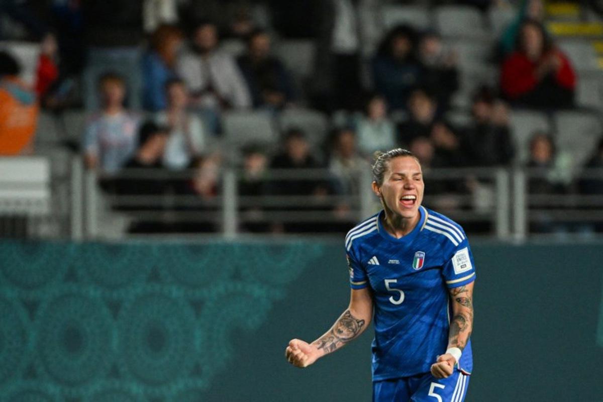 Italy's defender #05 Elena Linari celebrates her team's victory after the final whistle of the Australia and New Zealand 2023 Women's World Cup Group G football match between Italy and Argentina at Eden Park in Auckland on July 24, 2023.  Saeed KHAN / AFP