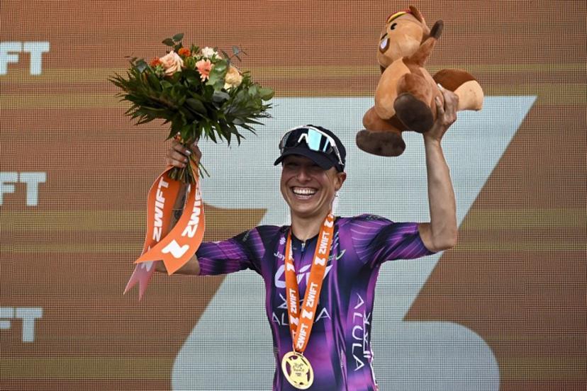 Liv-Alula-Jayco team's Spanish rider Mavi García celebrates on the podium after winning the 2nd stage (out of 9) of the fourth edition of the Women's Tour de France cycling race, 110,4 km from Brest to Quimper on July 27, 2025.  JULIEN DE ROSA / AFP