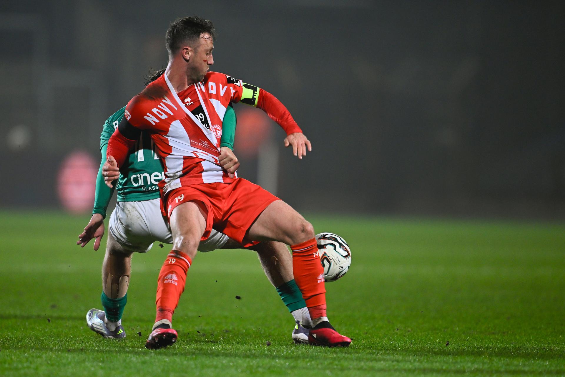 Lommel's Robin van Duiven and Kortrijk's Brecht Dejaegere fight for the ball during a soccer game between Lommel SK and KV Kortrijk, Saturday 07 March 2026 in Lommel, on day 28 (out of 34) of the 2025-2026 'Challenger Pro League' 1B second division of the Belgian championship. BELGA PHOTO JOHAN EYCKENS