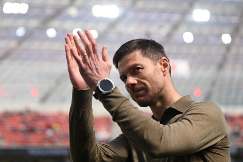 Bayer Leverkusen's Spanish head coach Xabi Alonso gestures prior to the German first division Bundesliga football match between Bayer 04 Leverkusen and FC Augsburg in Leverkusen, western Germany on April 26, 2025.  INA FASSBENDER / AFP