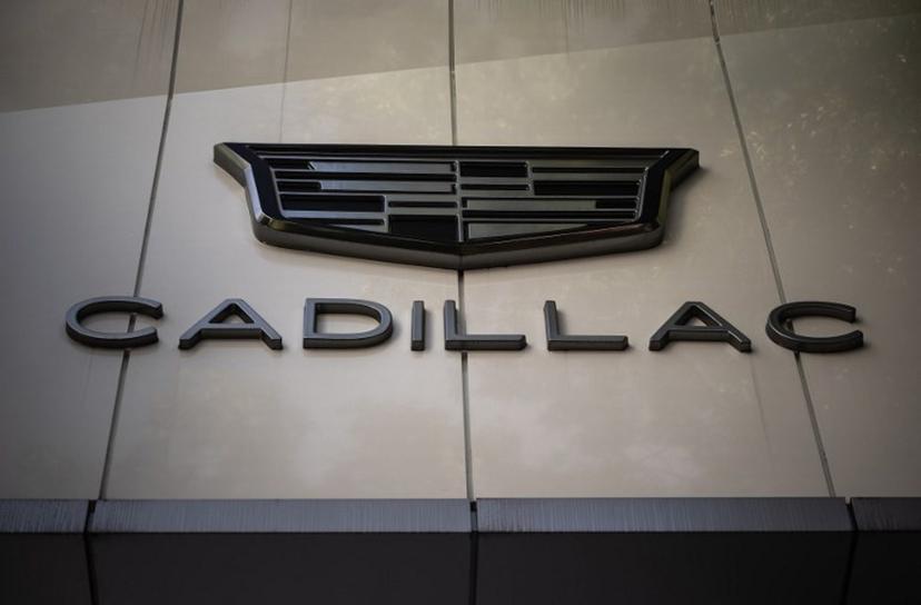 View of the Cadillac logo at a Cadillac car showroom in Mexico City on December 5, 2024.  Sales of luxury vehicles in Mexico registered a significant drop in 2024, in the face of a stronger presence of Chinese-made vehicles preferred by consumers.  CARL DE SOUZA / AFP