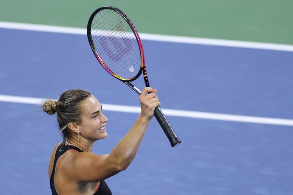 Belarus's Aryna Sabalenka celebrates after winning her women's singles third round tennis match against Canada's Leylah Fernandez on day six of the US Open tennis tournament at the USTA Billie Jean King National Tennis Center in New York City, on August 29, 2025.  CHARLY TRIBALLEAU / AFP