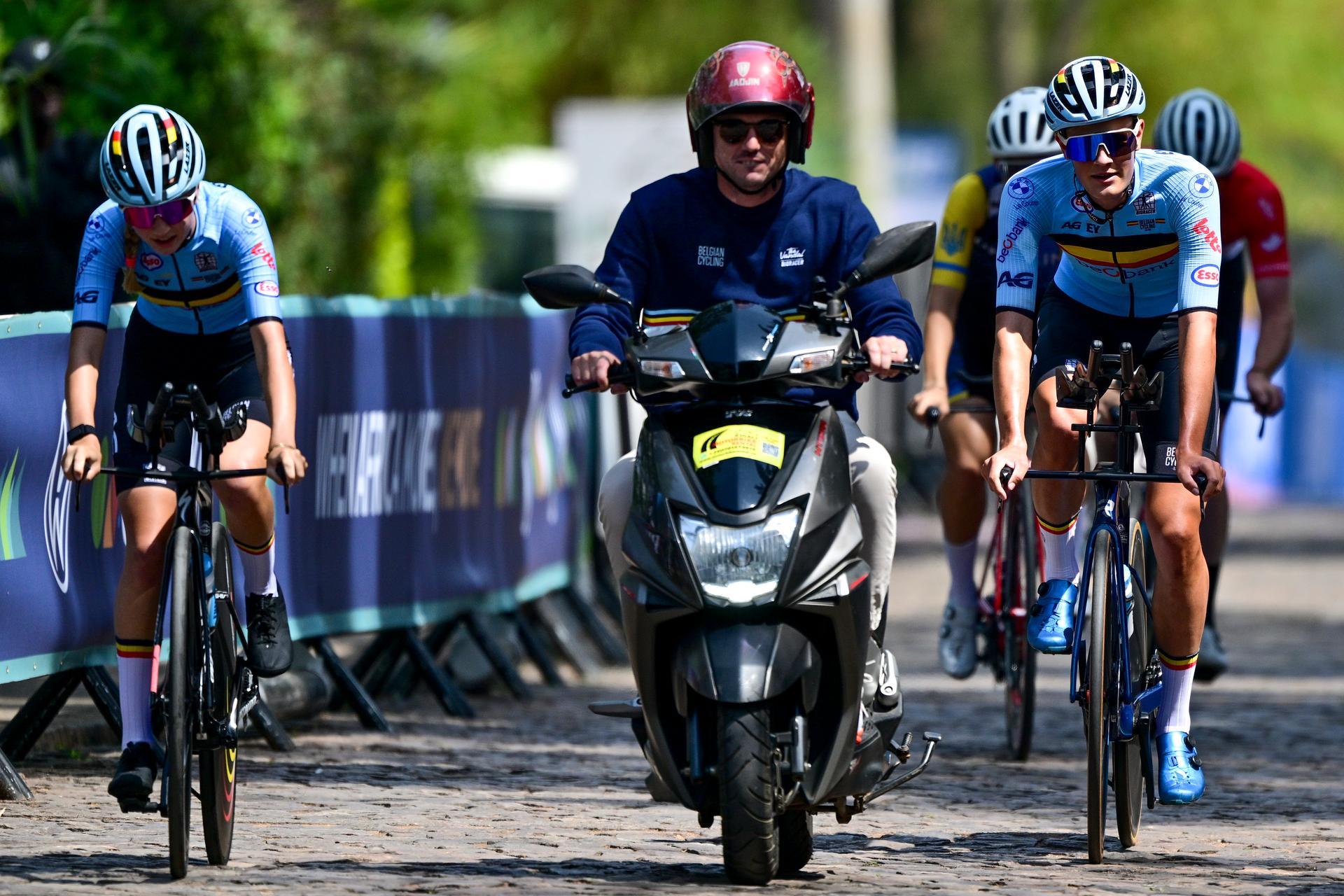 Belgian Laura Five, Coach of the Belgian national junior's cycling team Angelo De Clercq and Belgian Mats Vanden Eynde pictured during a training session before the cycling time trial World Championship, in Kigali, Rwanda, Saturday 20 September 2025. The road world championships are taking place from 21 to 28 September. BELGA PHOTO DIRK WAEM