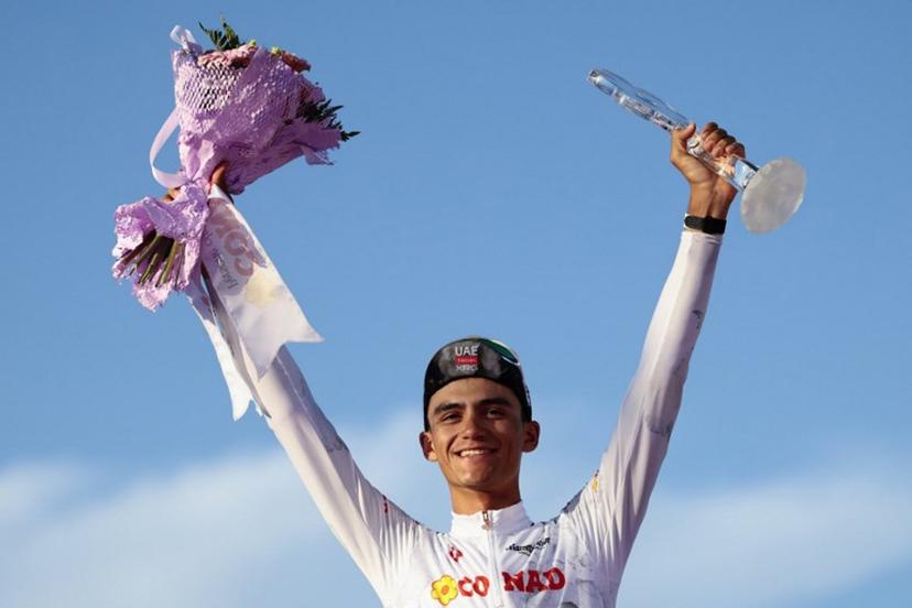 UAE Team Emirates XRG's Mexican rider Isaac Del Toro wearing the best young rider's white jersey (Maglia Bianca) celebrates on the podium at the end of the 21st and last stage of the 108th Giro d'Italia cycling race of 143kms from Rome to Rome on June 1, 2025.  Luca Bettini / AFP